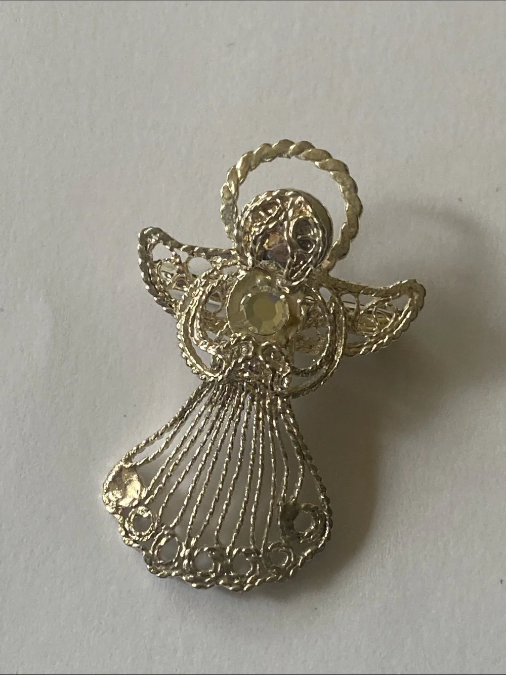 Silver tone vintage angel brooch